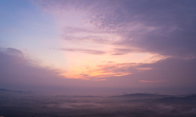 Magical sunet with sea of clouds. Landscape photo was taken from Wang Pha Mek, highlands of Trang, Thailand.