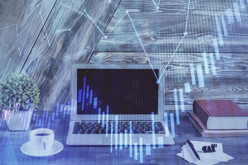 Multi exposure of forex graph and work space with computer. Concept of international online trading.