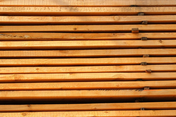 Wooden planks, lining, boards for construction works. Wooden planks for construction are sold in market.