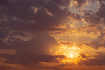 Beautiful sky, dawn, the rays of the sun break through the clouds. Natural background.