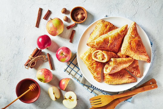 sweet apple turnover on a white plate