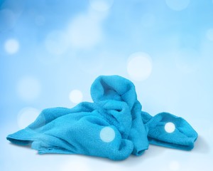 Clean blue towel on blurred background