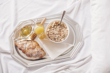 plate of pancakes with cream and chocolate sauce