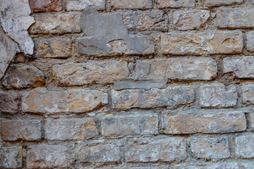 A rock. Brick wall. Background. Close-up.