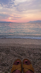 Scenic view of beautiful sunset above the Adriatic sea with foot fingers, Croatia