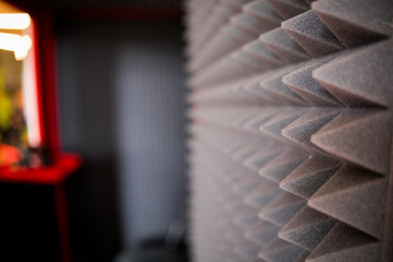 close up Sound Absorption, noise reduction texture in recorder room ,with light flare.