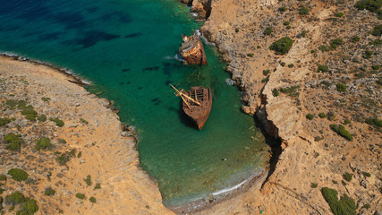 Aerial drone photo of old abandoned rusty shipwreck near area of Kalotaritissa, Amorgos island,...