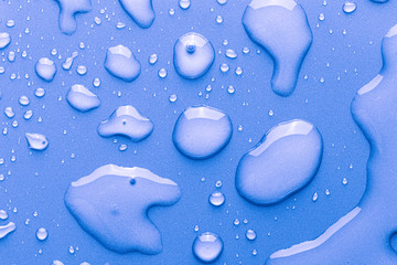 Drops of water on a color background.