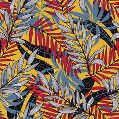 Tropical seamless pattern with leaves and plants on a yellow background. Colorful summer print. Trendy Hawaii print. Jungle leaf seamless vector floral pattern background. Modern design for fabric, pa