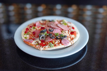 frozen pizza on a white plate