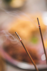 Incense Sticks For Indian Ritual Purpose. smoke coming out from burning incense sticks. Background...