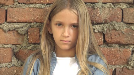 Sad Child, Not Playing Alone Kid, Unhappy Thoughtful Girl in Outdoor in Park