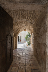 Passage leading to the Church of St. John the Baptist in the Old City in Jerusalem, Israel
