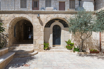 Fototapeta na wymiar The courtyard of the Church of St. John the Baptist in the Old City in Jerusalem, Israel