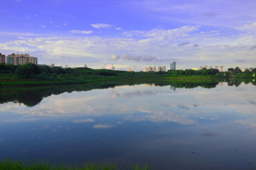 Fototapeta premium Landscape with lake and clouds in Jakarta