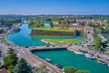 Fototapeta na wymiar Beautiful view of the city of Peschiera del Garda, Italy. Aerial photography with drone.