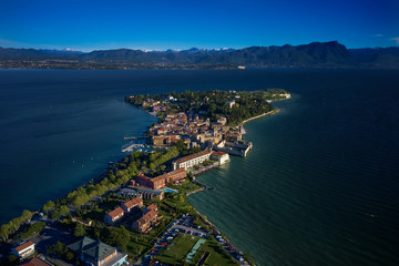 Rocca Scaligera Castle in Sirmione Lake Garda Italy. Aerial view.