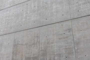 Wall of dark gray concrete blocks