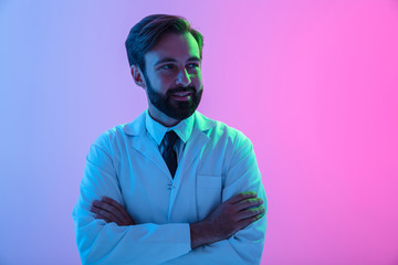 Portrait of a confident young man doctor wearing uniform