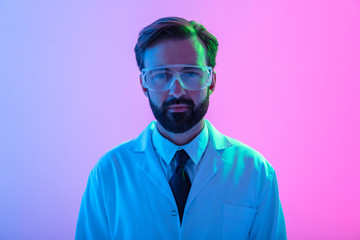Portrait of a confident young man doctor wearing uniform