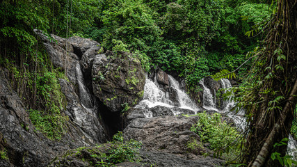 Fototapeta na wymiar Exotic Natural Rock Cliff Waterfall