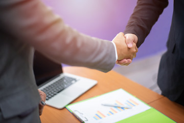 close up businessman man and businesswoman handshake for partner, Business concept.