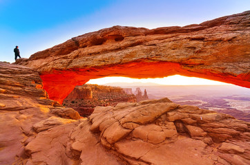 View of the Mesa Arch at dawn in the Canyonlands National Park in Utah, USA.