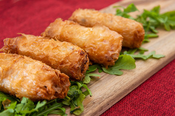 pork spring rolls Rice cakes stuffed with a pork stuffing accompanied by sauce