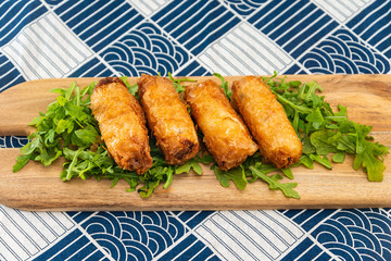pork spring rolls Rice cakes stuffed with a pork stuffing accompanied by sauce