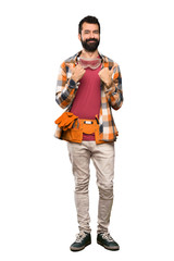 Craftsmen man with thumbs up gesture and smiling over isolated white background