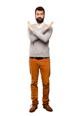 Handsome man making NO gesture over isolated white background