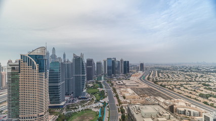 Fototapeta na wymiar Jumeirah Lake Towers residential district aerial timelapse near Dubai Marina