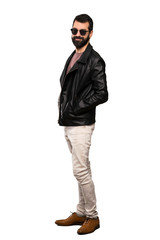 Naklejka premium Handsome man with beard with glasses and smiling over isolated white background