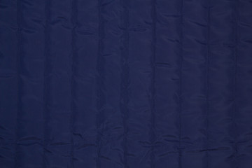 Fabric quilted color. The texture of the quilted jackets.
