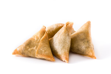 Samsa or samosas with meat and vegetables isolated on white background. Traditional Indian food