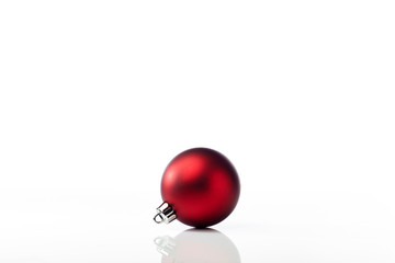 red christmas bauble on white background