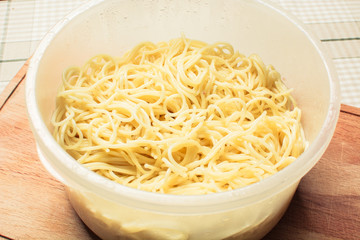 Long spaghetti after cooking in an eggplant.