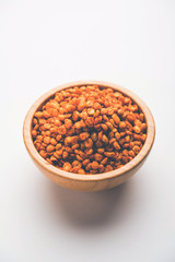 Fried and Spicy Chana Dal Masala is a popular Chakna recipe. served in a bowl. selective focus