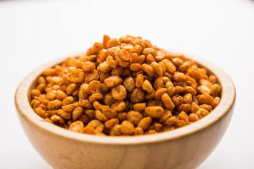 Fried and Spicy Chana Dal Masala is a popular Chakna recipe. served in a bowl. selective focus