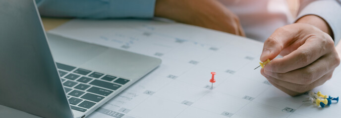 Business Man with laptop, Calendar in office, Business management event . Organizational management, business plan targeted marketing activities, media relations advertising.