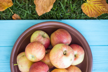 juicy apples on a wooden background