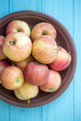 juicy apples on a wooden background