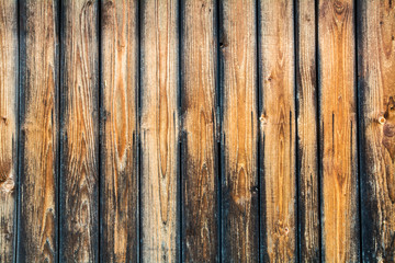 Background from dark brown boards made of pine wood.