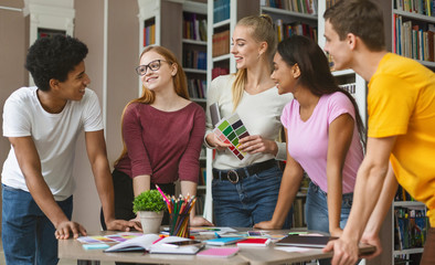 Group of students choosing color for future project