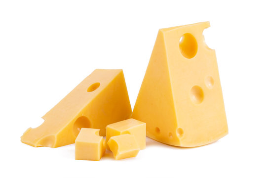 pieces of tasty yellow cheese isolated on white background