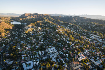 Early morning aerial cityscape view of Hollywood area hillside homes in Los Angeles, California.  