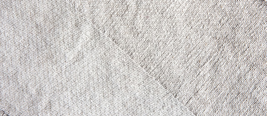 Light texture of natural eco fabric close up, trend background, waste recycling