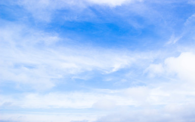 Blue sky background with white dramatic colorful clouds. Natural sky landscape view, sky background with white clouds in the blue sky. Clear vast sky with fluffy clouds for wallpaper.