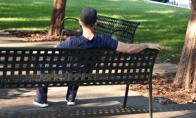 Man sitting on a bench in the park