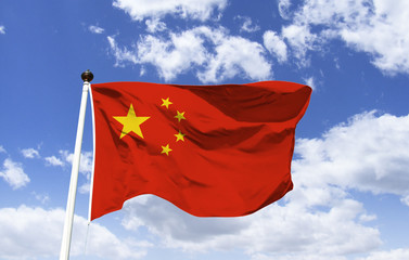 Chinese flag mockup fluttering in the blue sky. Known as the Five-Pointed Yellow Five-Star Red Flag, the largest symbolizes the CCP and the four smaller Chinese.